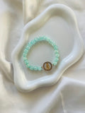 Bracelet Vert d’Eau & Médaille Dorée